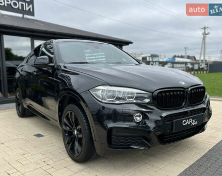 Черный БМВ Х6, объемом двигателя 3 л и пробегом 97 тыс. км за 34900 $, фото 1 на Automoto.ua