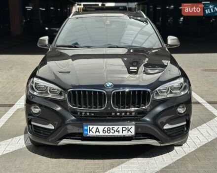 Черный БМВ Х6, объемом двигателя 3 л и пробегом 75 тыс. км за 39300 $, фото 2 на Automoto.ua