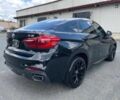 Чорний БМВ Х6, об'ємом двигуна 3 л та пробігом 89 тис. км за 12000 $, фото 6 на Automoto.ua