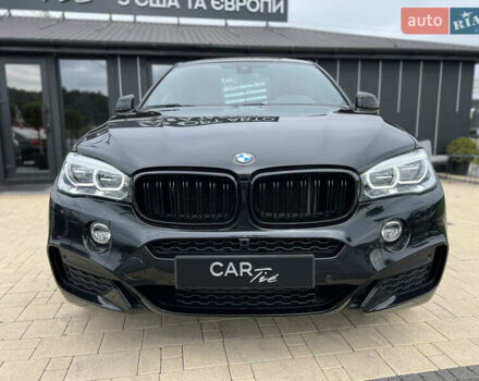 Черный БМВ Х6, объемом двигателя 3 л и пробегом 97 тыс. км за 34900 $, фото 2 на Automoto.ua