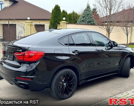 Черный БМВ Х6, объемом двигателя 3 л и пробегом 167 тыс. км за 29999 $, фото 1 на Automoto.ua