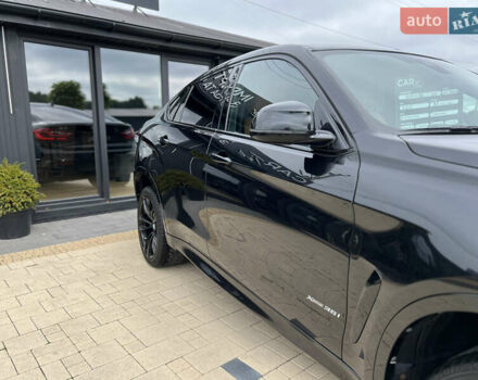 Черный БМВ Х6, объемом двигателя 3 л и пробегом 97 тыс. км за 34900 $, фото 4 на Automoto.ua