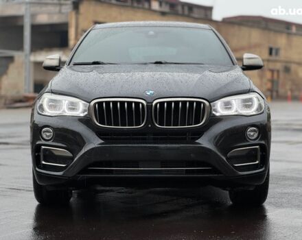 Черный БМВ Х6, объемом двигателя 3 л и пробегом 104 тыс. км за 35490 $, фото 3 на Automoto.ua