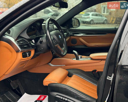 Черный БМВ Х6, объемом двигателя 3 л и пробегом 104 тыс. км за 35490 $, фото 22 на Automoto.ua