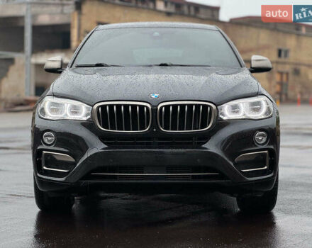 Черный БМВ Х6, объемом двигателя 3 л и пробегом 104 тыс. км за 35490 $, фото 1 на Automoto.ua