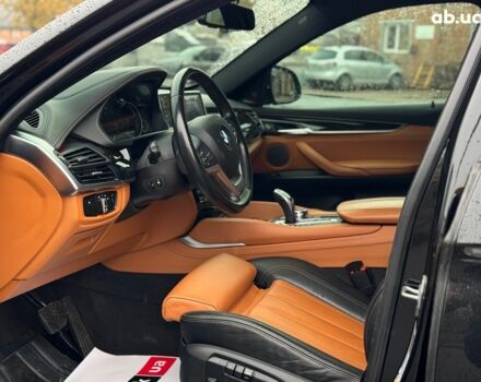 Черный БМВ Х6, объемом двигателя 3 л и пробегом 104 тыс. км за 35490 $, фото 22 на Automoto.ua