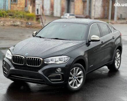 Черный БМВ Х6, объемом двигателя 3 л и пробегом 104 тыс. км за 35490 $, фото 1 на Automoto.ua