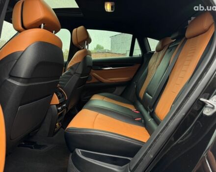 Черный БМВ Х6, объемом двигателя 3 л и пробегом 104 тыс. км за 35490 $, фото 47 на Automoto.ua