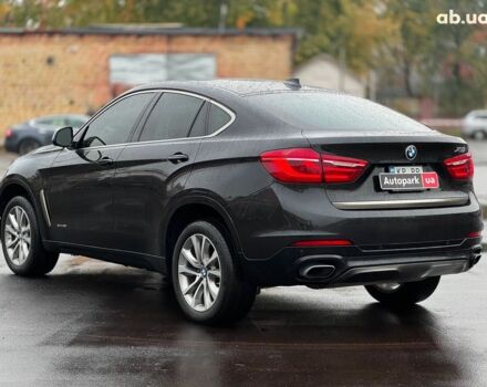 Черный БМВ Х6, объемом двигателя 3 л и пробегом 104 тыс. км за 35490 $, фото 8 на Automoto.ua
