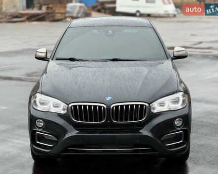 Черный БМВ Х6, объемом двигателя 3 л и пробегом 104 тыс. км за 35490 $, фото 4 на Automoto.ua