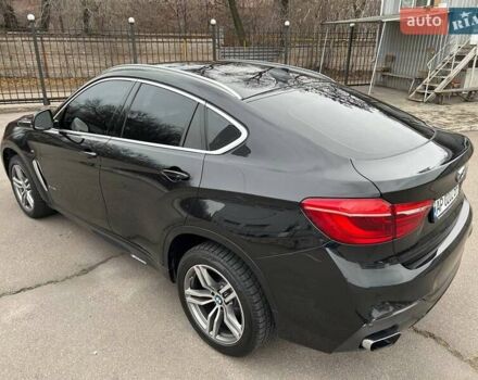 Чорний БМВ Х6, об'ємом двигуна 2.98 л та пробігом 216 тис. км за 35000 $, фото 6 на Automoto.ua
