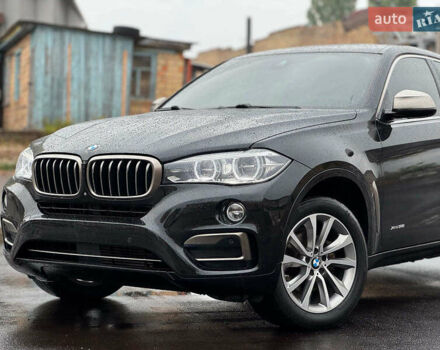 Черный БМВ Х6, объемом двигателя 3 л и пробегом 104 тыс. км за 35490 $, фото 3 на Automoto.ua
