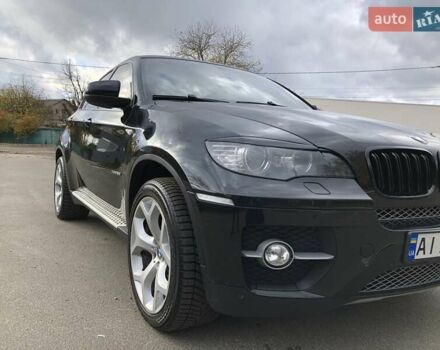 Чорний БМВ Х6, об'ємом двигуна 3 л та пробігом 203 тис. км за 12000 $, фото 1 на Automoto.ua