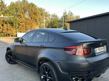 Черный БМВ Х6, объемом двигателя 3 л и пробегом 215 тыс. км за 14000 $, фото 1 на Automoto.ua