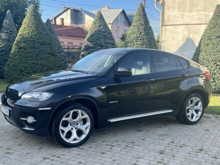 Черный БМВ Х6, объемом двигателя 3 л и пробегом 103 тыс. км за 14977 $, фото 1 на Automoto.ua