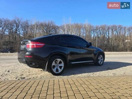 Чорний БМВ Х6, об'ємом двигуна 3 л та пробігом 230 тис. км за 10800 $, фото 1 на Automoto.ua