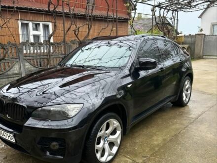 Черный БМВ Х6, объемом двигателя 3 л и пробегом 280 тыс. км за 20000 $, фото 1 на Automoto.ua