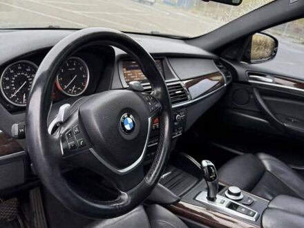 Черный БМВ Х6, объемом двигателя 4.4 л и пробегом 215 тыс. км за 12500 $, фото 1 на Automoto.ua