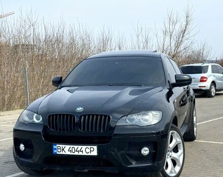 Черный БМВ Х6, объемом двигателя 3 л и пробегом 200 тыс. км за 12500 $, фото 1 на Automoto.ua
