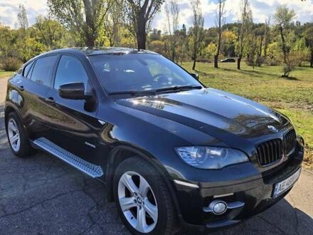 Черный БМВ Х6, объемом двигателя 4.4 л и пробегом 239 тыс. км за 14999 $, фото 1 на Automoto.ua