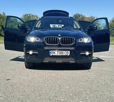 Черный БМВ Х6, объемом двигателя 3 л и пробегом 275 тыс. км за 18000 $, фото 1 на Automoto.ua