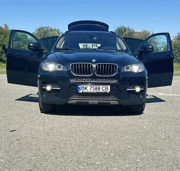 Черный БМВ Х6, объемом двигателя 3 л и пробегом 275 тыс. км за 18000 $, фото 1 на Automoto.ua