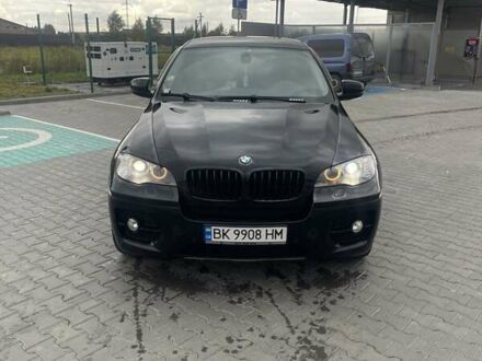 Черный БМВ Х6, объемом двигателя 3 л и пробегом 210 тыс. км за 19800 $, фото 1 на Automoto.ua