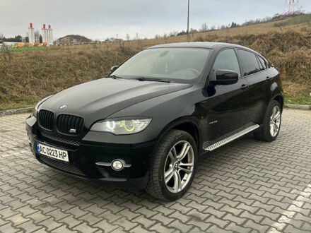 Черный БМВ Х6, объемом двигателя 3 л и пробегом 315 тыс. км за 18000 $, фото 1 на Automoto.ua