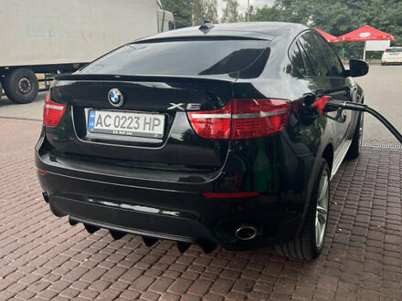 Чорний БМВ Х6, об'ємом двигуна 3 л та пробігом 310 тис. км за 20000 $, фото 1 на Automoto.ua