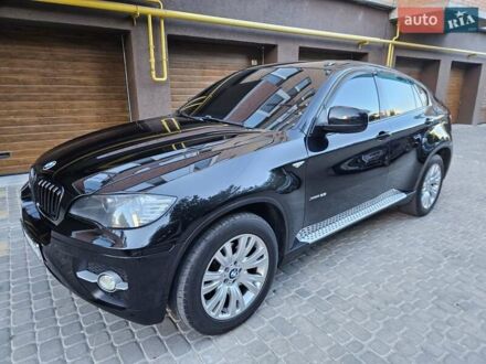 Черный БМВ Х6, объемом двигателя 3 л и пробегом 301 тыс. км за 16200 $, фото 1 на Automoto.ua