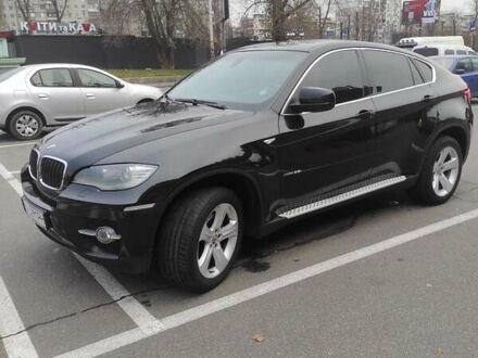 Черный БМВ Х6, объемом двигателя 3 л и пробегом 142 тыс. км за 17500 $, фото 1 на Automoto.ua