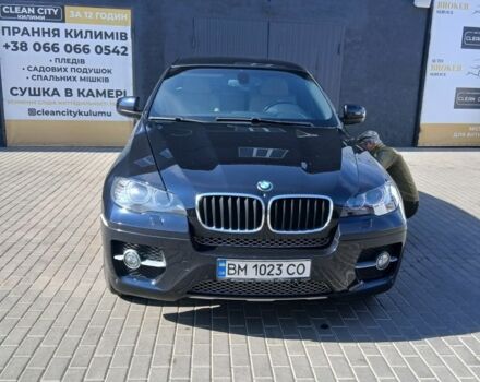 Черный БМВ Х6, объемом двигателя 3 л и пробегом 101 тыс. км за 18757 $, фото 1 на Automoto.ua
