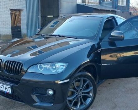 Черный БМВ Х6, объемом двигателя 3 л и пробегом 136 тыс. км за 24500 $, фото 1 на Automoto.ua