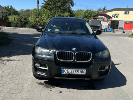Черный БМВ Х6, объемом двигателя 3 л и пробегом 305 тыс. км за 19999 $, фото 1 на Automoto.ua
