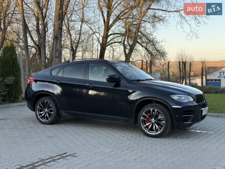 Черный БМВ Х6, объемом двигателя 3 л и пробегом 300 тыс. км за 27500 $, фото 1 на Automoto.ua