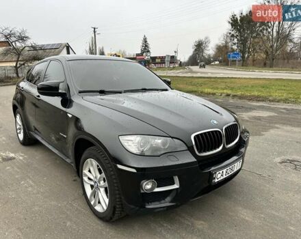 Черный БМВ Х6, объемом двигателя 3 л и пробегом 162 тыс. км за 20700 $, фото 1 на Automoto.ua