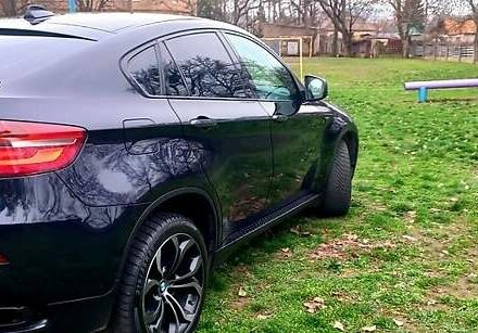 Черный БМВ Х6, объемом двигателя 3 л и пробегом 168 тыс. км за 26500 $, фото 1 на Automoto.ua