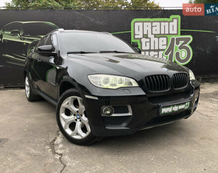 Черный БМВ Х6, объемом двигателя 3 л и пробегом 216 тыс. км за 26000 $, фото 1 на Automoto.ua