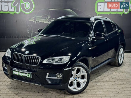 Чорний БМВ Х6, об'ємом двигуна 3 л та пробігом 216 тис. км за 24999 $, фото 1 на Automoto.ua