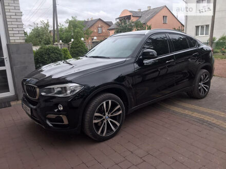 Чорний БМВ Х6, об'ємом двигуна 3 л та пробігом 130 тис. км за 33700 $, фото 1 на Automoto.ua