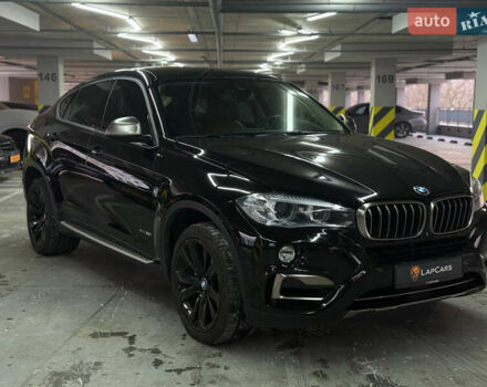 Черный БМВ Х6, объемом двигателя 4.39 л и пробегом 128 тыс. км за 34000 $, фото 1 на Automoto.ua
