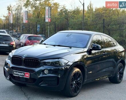 Черный БМВ Х6, объемом двигателя 3 л и пробегом 145 тыс. км за 25490 $, фото 1 на Automoto.ua