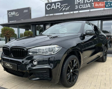 Чорний БМВ Х6, об'ємом двигуна 3 л та пробігом 97 тис. км за 34900 $, фото 1 на Automoto.ua