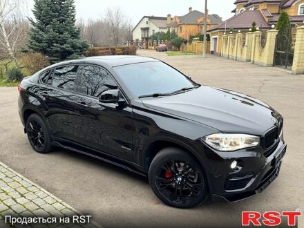 Черный БМВ Х6, объемом двигателя 3 л и пробегом 167 тыс. км за 29999 $, фото 1 на Automoto.ua