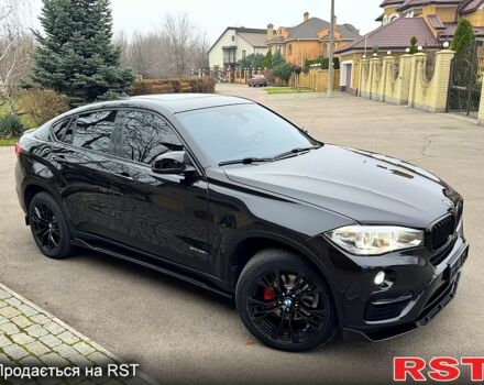 Чорний БМВ Х6, об'ємом двигуна 3 л та пробігом 167 тис. км за 29999 $, фото 1 на Automoto.ua