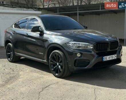 Черный БМВ Х6, объемом двигателя 3 л и пробегом 71 тыс. км за 35700 $, фото 1 на Automoto.ua