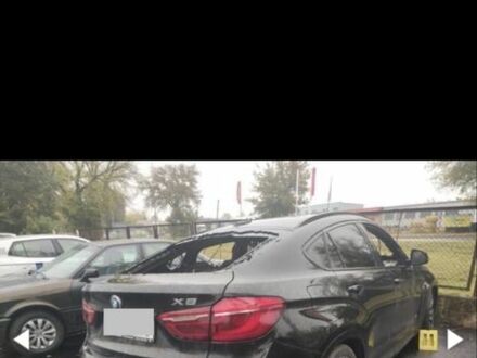 Черный БМВ Х6, объемом двигателя 3 л и пробегом 90 тыс. км за 1000 $, фото 1 на Automoto.ua