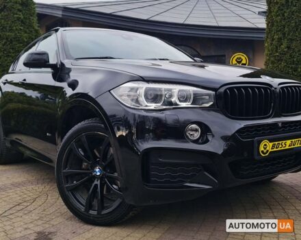 Чорний БМВ Х6, об'ємом двигуна 3 л та пробігом 100 тис. км за 51900 $, фото 1 на Automoto.ua