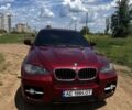Красный БМВ Х6, объемом двигателя 3 л и пробегом 200 тыс. км за 14000 $, фото 1 на Automoto.ua