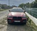 Червоний БМВ Х6, об'ємом двигуна 3 л та пробігом 174 тис. км за 15999 $, фото 1 на Automoto.ua